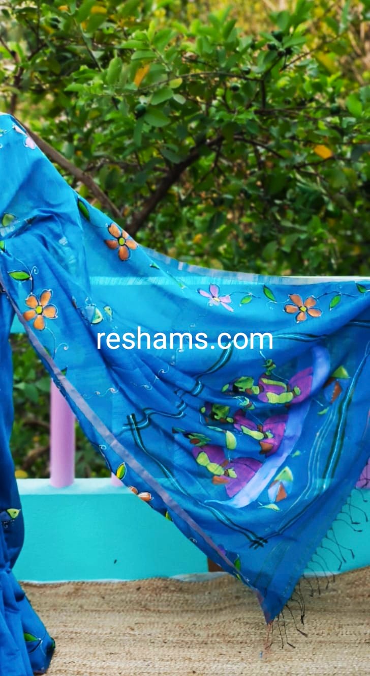 Linen Cotton Hand Paint Saree – Sky Blue Body with Tribal Hand painting and Golden Zari Border